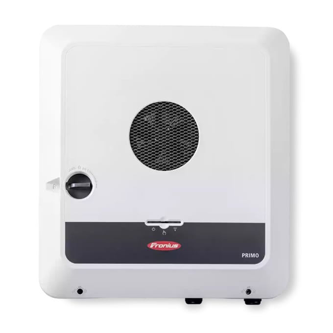 A white, wall-mounted Fronius Primo inverter with a central ventilation grill and black bottom panel featuring the brand logo.