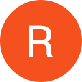 The letter r in an orange circle.