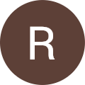 The letter r in a brown circle.