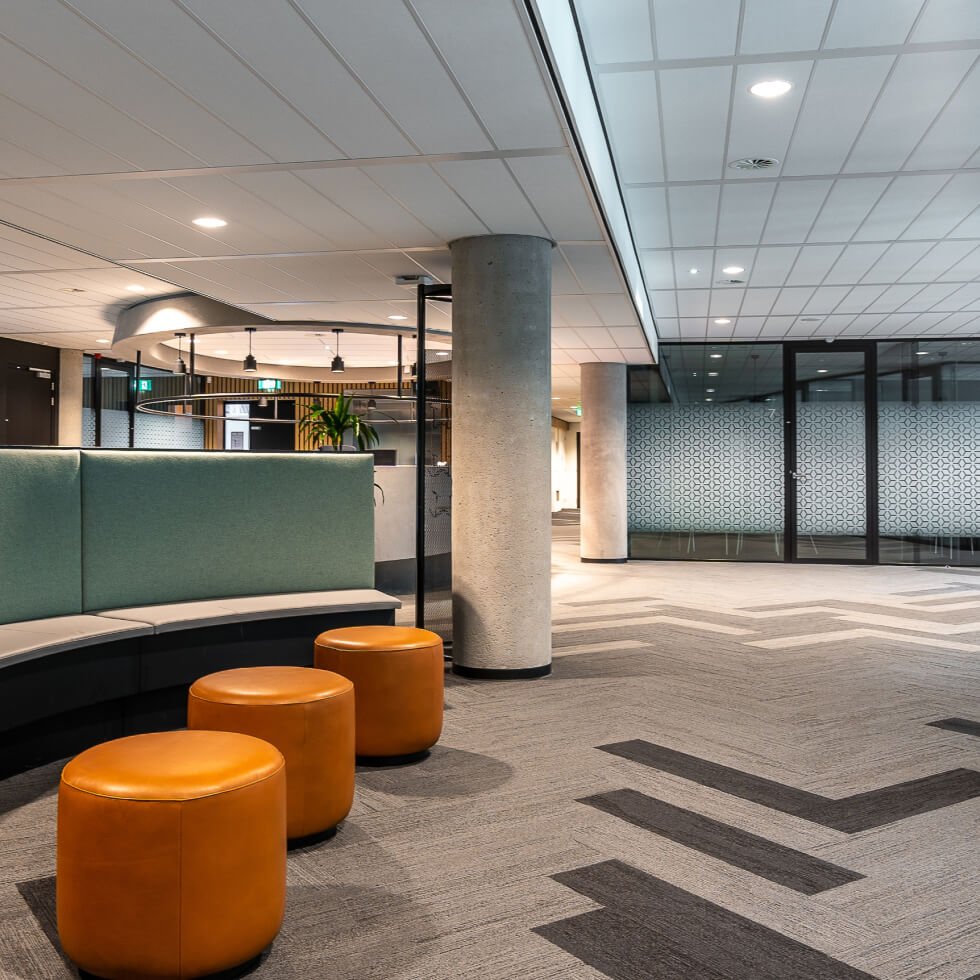 An office with orange stools on the sunshine coast.