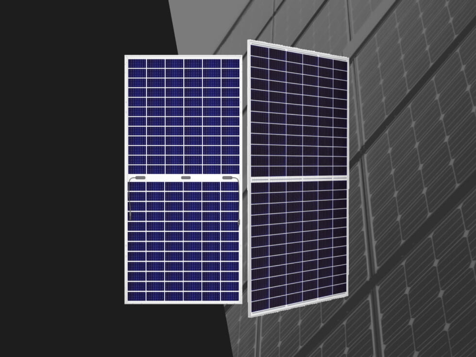 Two solar panels in front of a building.